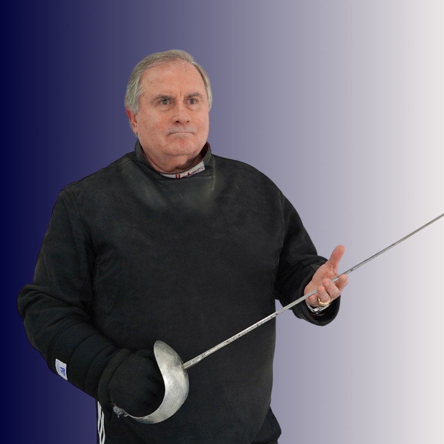 An older man dressed in black holding a fencing sword, looking serious against a gradient background.