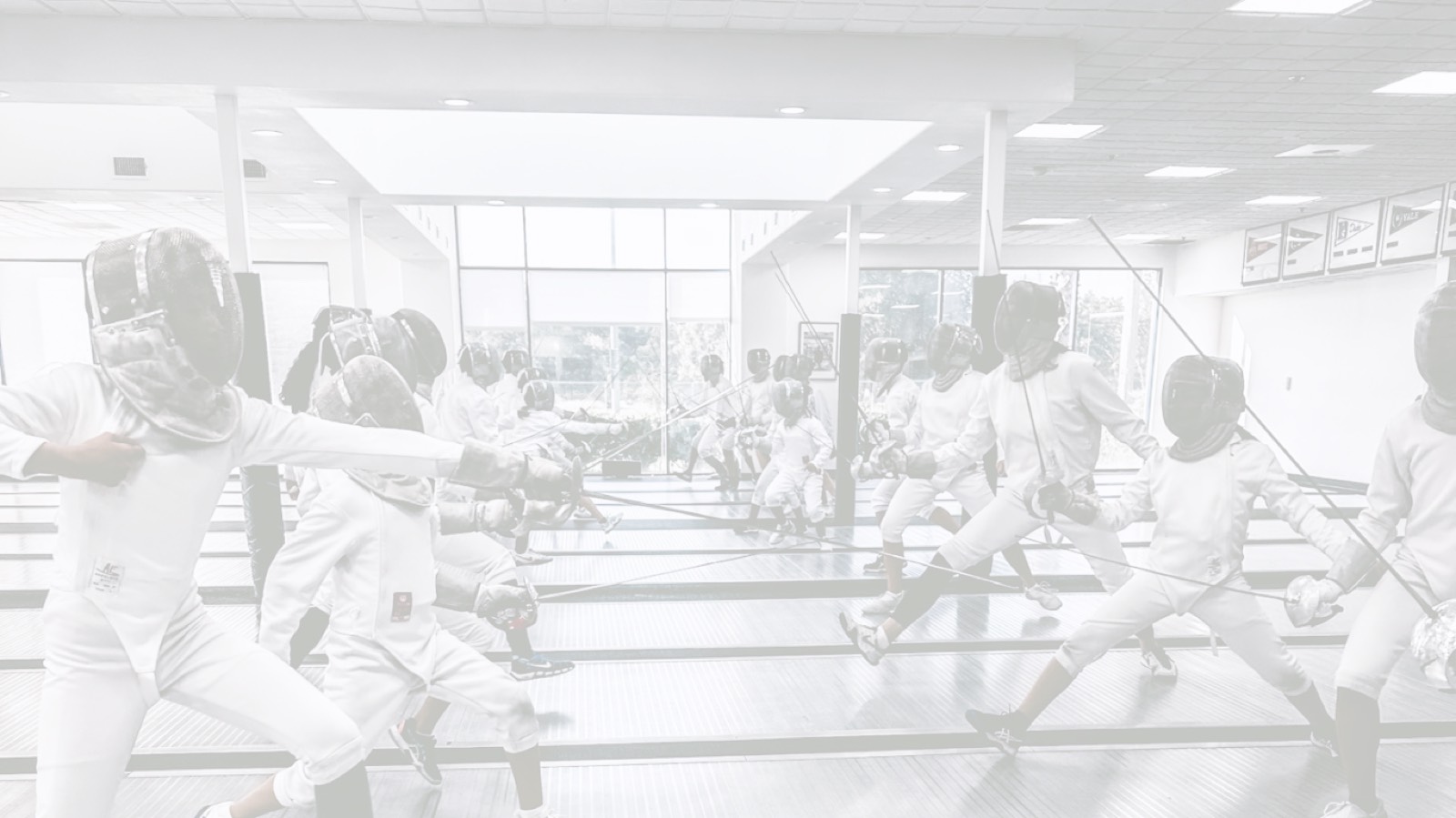 Children training in saber fencing at Premier Fencing Academy, Sacramento